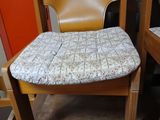 two chairs that are sitting next to each other on a table