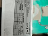 a white box with a label on it sitting on top of a table