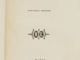 an old book with a black and white title on it