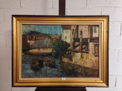 une image d'un tableau sur un chevalet dans une pièce