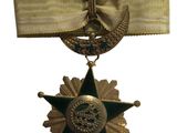 une image représentant une médaille ornée d'une étoile et entourée d'un ruban