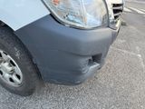 a close up of a car that has a dent in it