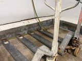 a hand truck that is sitting in the garage