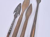 several different types of tools sitting on top of a white surface