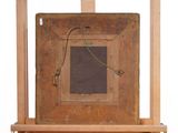 a picture of an old wooden easel with a picture on it