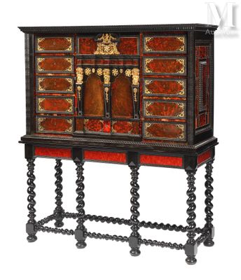 an old wooden cabinet with red and black paint on it