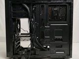 a black computer case with wires and wires attached to it