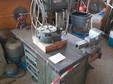 an image of a workbench in a garage with tools