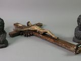 three statues of jesus on the cross and a statue of jesus on the cross