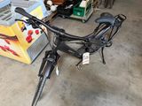 a bicycle that is parked in a garage