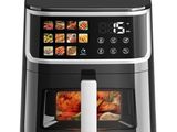 a black and silver air fryer sitting on top of a counter