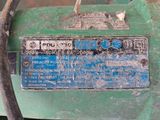 a close up of a metal sign on a machine
