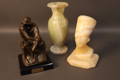 three vases sitting next to each other on a table