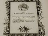 photographie en noir et blanc d'une plaque sur laquelle figure l'image d'un homme et d'une femme