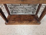 an image of a wooden table with a drawer underneath it