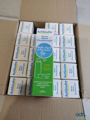 a cardboard box with a bunch of soap bars in it