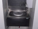 a sink in a stall with a number 511 on it
