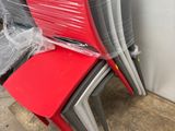 a lot of chairs that are wrapped up and ready to be used