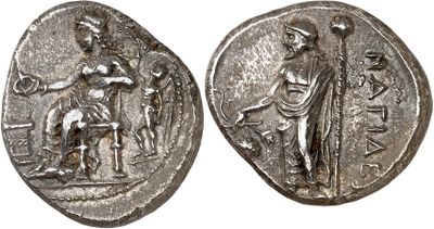 a silver coin with an image of a man and a woman