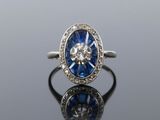an antique sapphire and diamond cluster ring
