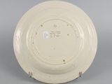 underside view of a plate showing the bottom of the plate