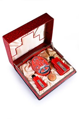 a red box with a lot of items inside of it