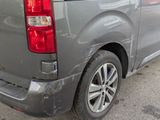 a van that has been vandalized with a sticker on it