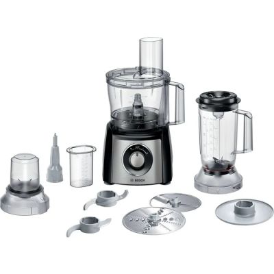a picture of a blender with a lot of food in it