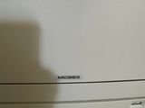 a photo of a printer that is sitting on the floor