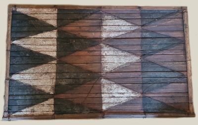 a piece of wood that has been painted with different colors