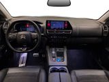 the interior of a car with a dashboard and a steering wheel