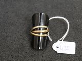 a ring that is sitting on top of a ring holder