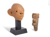 an image of a statue of a man and a small statue of a woman