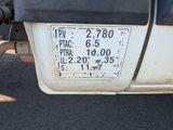 a close up of a license plate on the back of a truck