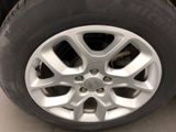 a close up view of a tire on a car