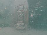 a picture of a window with a broken glass on it