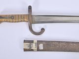 an image of a knife and a sword on a white surface
