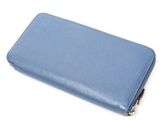 the blue leather wallet is open on a white surface