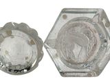 a glass ashtray and a glass ashtray on a white background