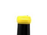 a bottle of wine that is sitting on a table