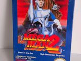 La boîte du jeu Mega Man 2 est posée sur la table.