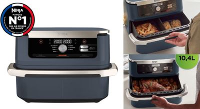 an image of a man holding a tray of food in front of an air fryer