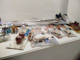 a white table with a bunch of items on top of it