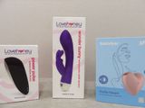 three boxes of lovehoney products sitting on a table