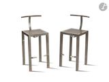 pair of metal barstools with wooden seat and backrests