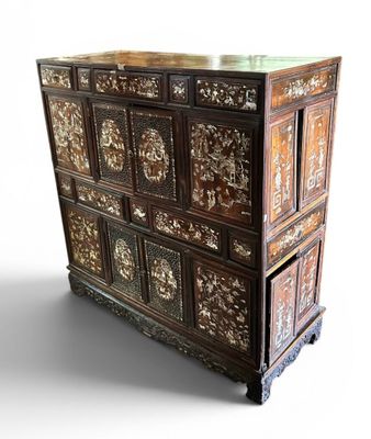 a wooden chest of drawers with many drawers on top of it