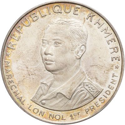an image of a silver coin with a portrait of a man on it