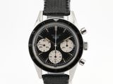une image représentant une montre en noir et blanc sur fond blanc
