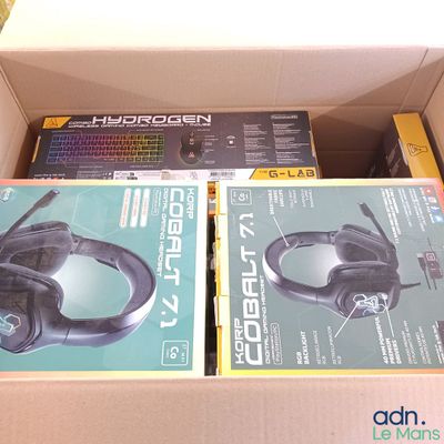 two boxes of headphones in a box on the floor