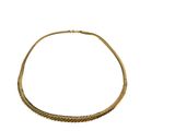 an image of a gold necklace on a white background